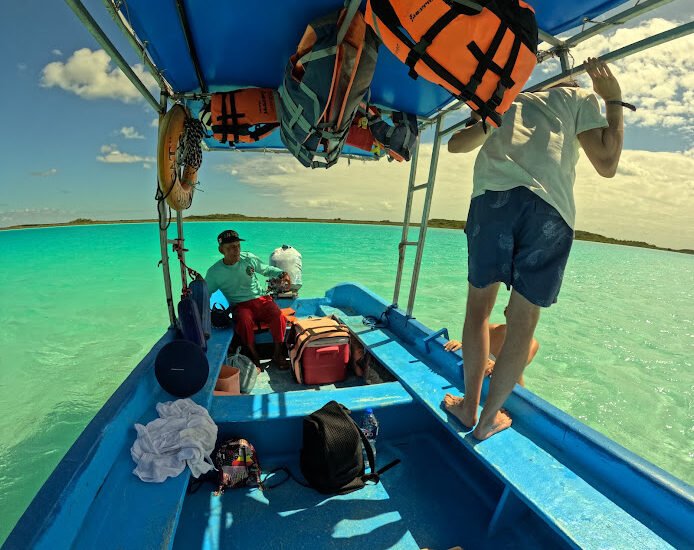 Private boat tour in Tulum's turquoise waters